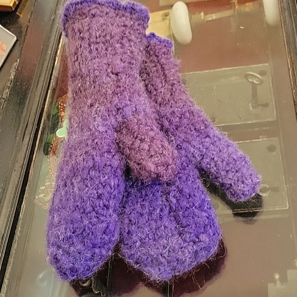 Ladies fuzzy Acrylic crocheted varigated purple mittens with cream fleece lining
